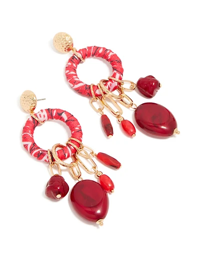 Boucles d'oreilles pendantes dorées et rouges, ornées de perles et enveloppées de papier
