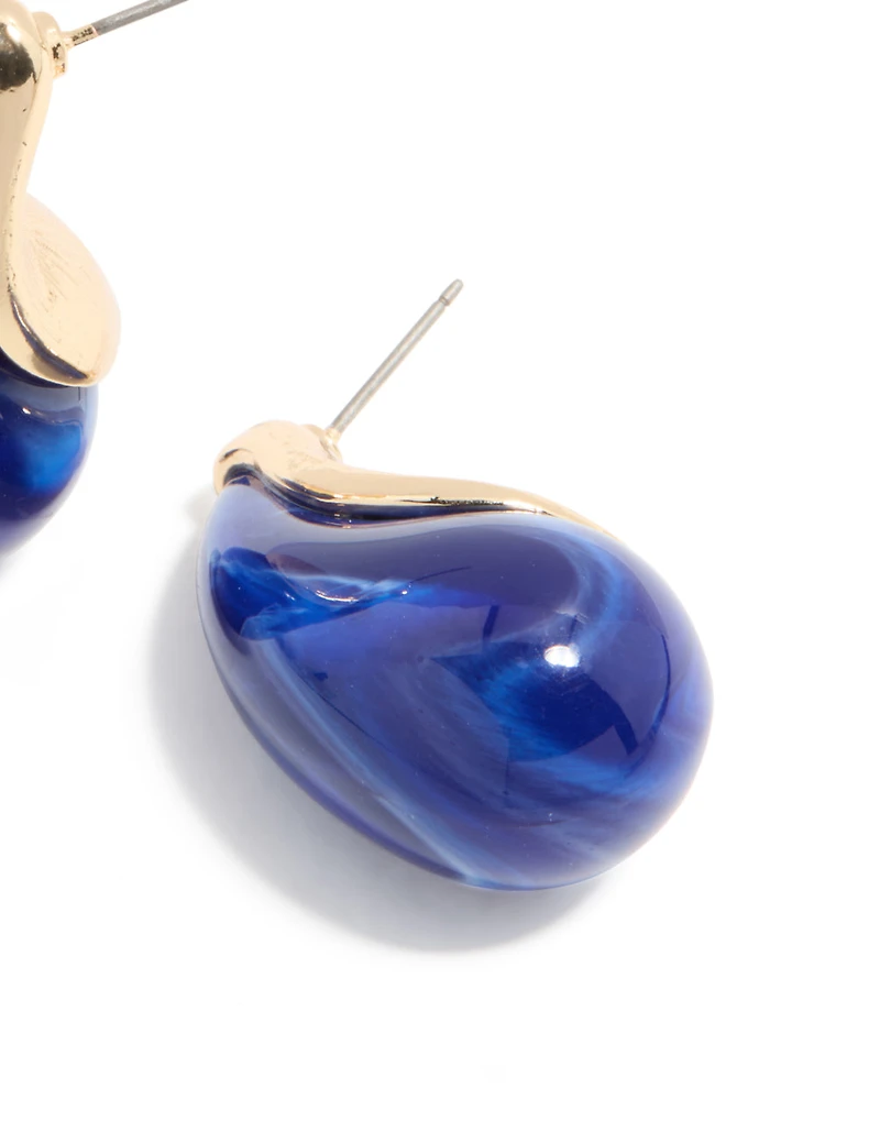 Boucles d’oreilles en poire bleue dorée