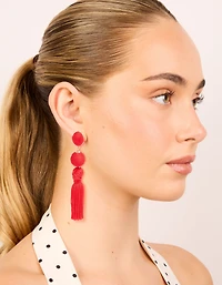 Boucles d’oreilles tombantes en tissu rouge