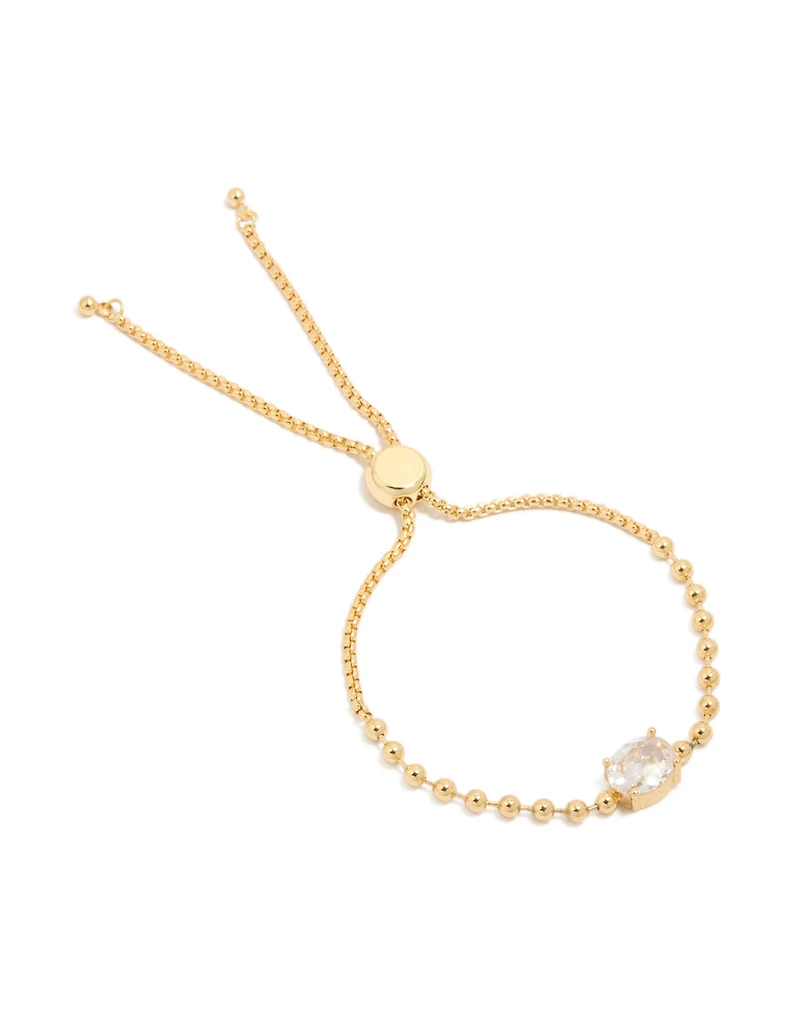 Bracelet à chaîne à bascule ovale en balle d’or et en zircone cubique