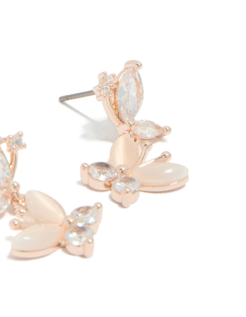 Boucles d'oreilles pendantes à double papillon plaquées or rose et zircon cubique
