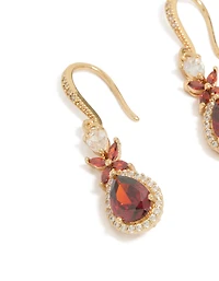 Boucles d'oreilles pendantes en or et zircone cubique rouge