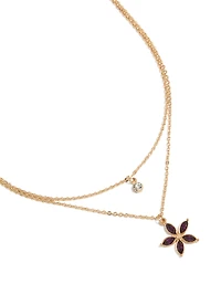 Collier à plusieurs rangs de fleurs en or clair et violet orné de diamants.