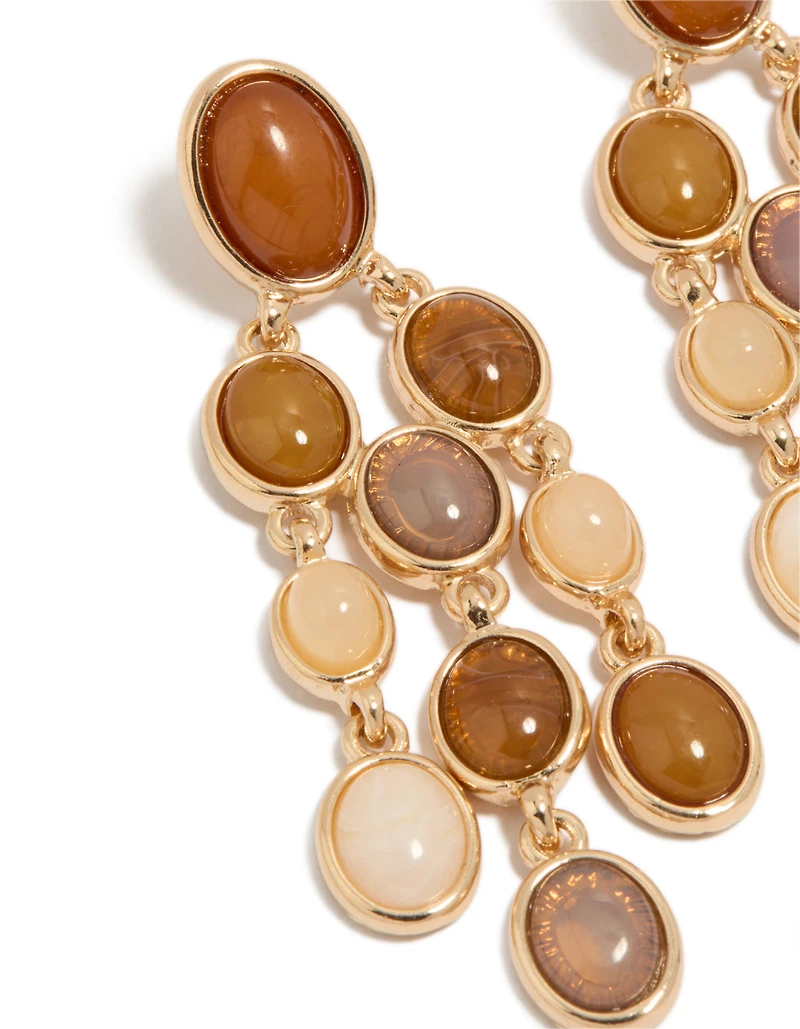 Boucles d'oreilles pendantes ovales en pierres brunes et or