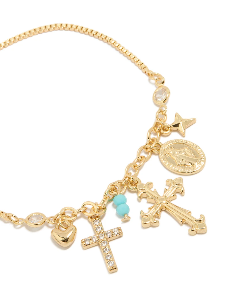Bracelet à fermoir à bascule plaqué or avec breloques croix et cœur en zircone cubique