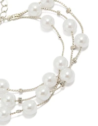 Bracelet à plusieurs rangs de perles argentées