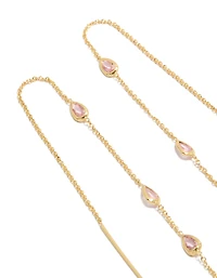 Boucles d'oreilles pendantes en forme de poire, plaquées or, ornées de strass roses.