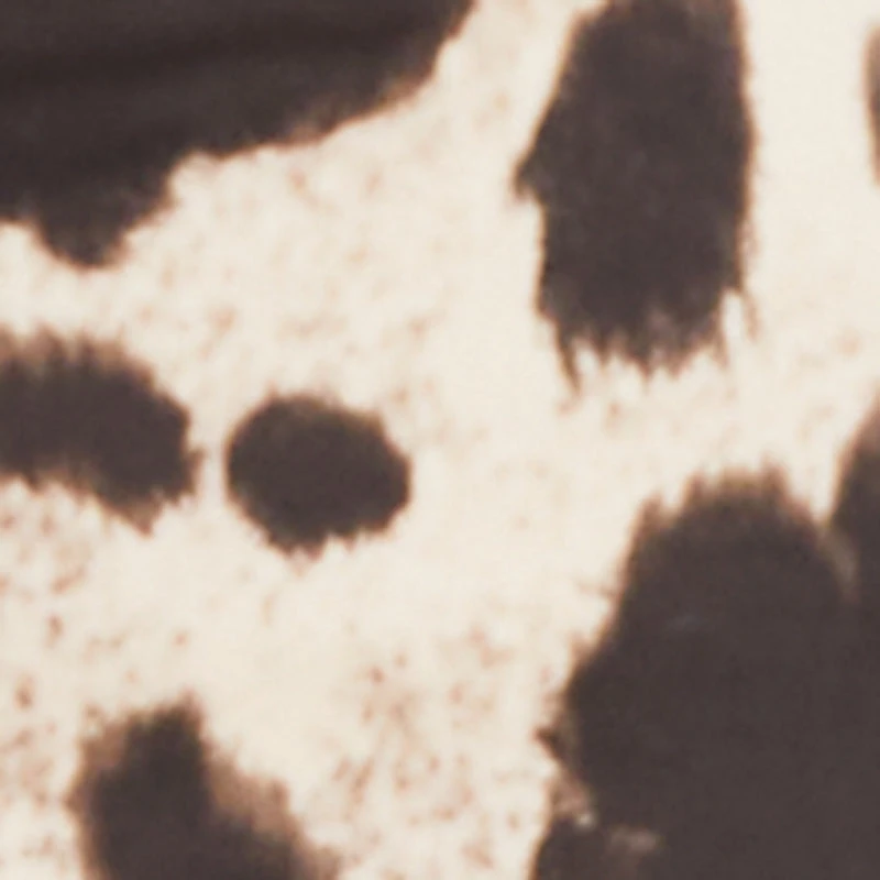 Cow Print Raw Hem Mini Skirt