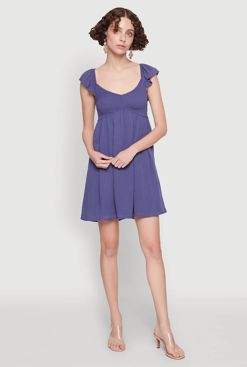 Smocked Flutter Sleeve Empire Waist Mini Dress