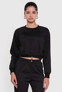 Almost Famous Toggle Drawstring Hem Cropped Raglan Sweatshirt