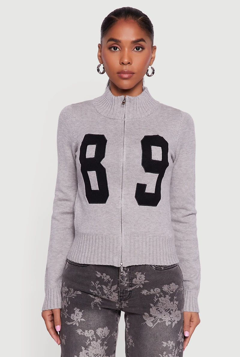 89 Graphic Mock Neck Zip Front Sweater
