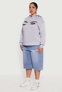 Plus Fleece Pullover Hoodie with Winking Eye Graphic