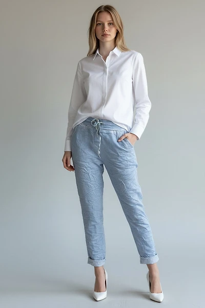 Crumpled pants with lurex accents