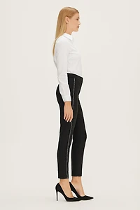Crumpled pants with braided/strass inserts