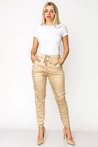 Satin-finish crumpled pants with embroidery and sequins - Italy