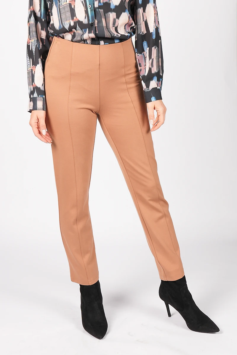 HIGH-WAISTED PANTS AND 28-INCH ANKLE BOOTS