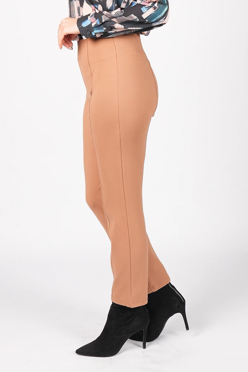 HIGH-WAISTED PANTS AND 28-INCH ANKLE BOOTS