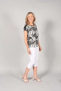 SHORT SLEEVE TOP WITH BUTTONS ON THE SHOULDERS