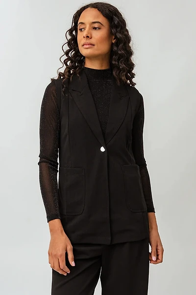 La veste sans manches 1 bouton
