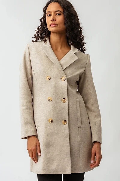 Le manteau de lainage 6 boutons