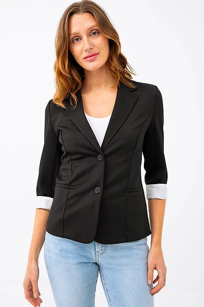 Le blazer manches à revers contraste