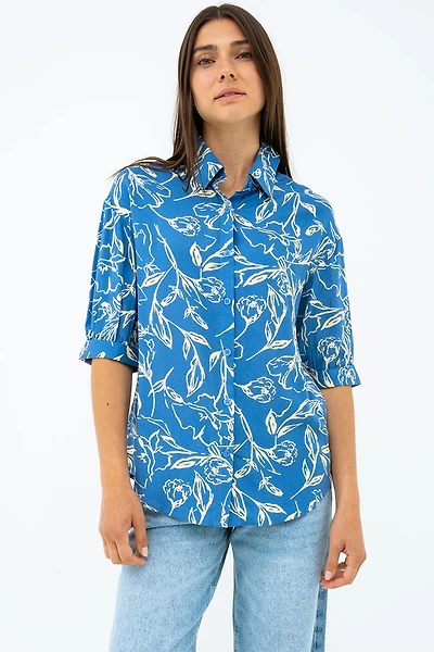 La blouse imprimée manches ballon bouton assorti