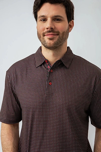 Le polo imprimé all-over abstrait
