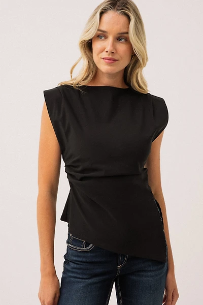 La blouse noire sans manche