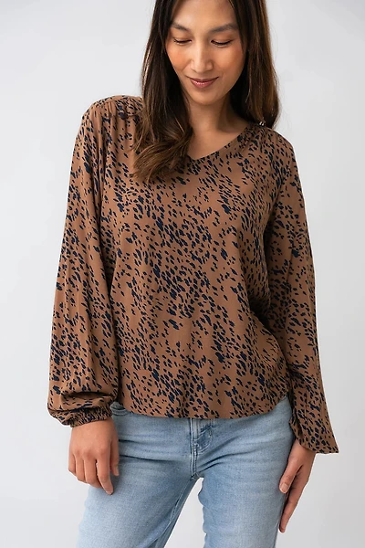 La blouse tachetée bicolore