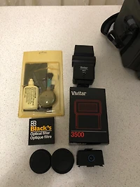 Pentax K1000 35mm SLR Film Camera Kit w/50mm Lens, Pentax Camera Cover, Vivitar 3500 Flash