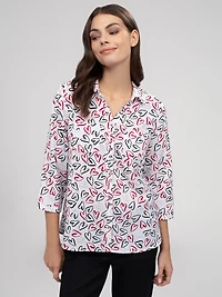 Blouse longueur tunique semi-ajustée à manches 3/4 avec boutons