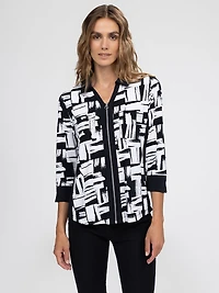 Blouse semi-ajustée à manches 3/4 avec boutons