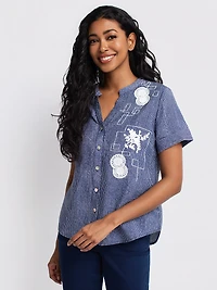 Blouse ample à manches courtes avec boutons