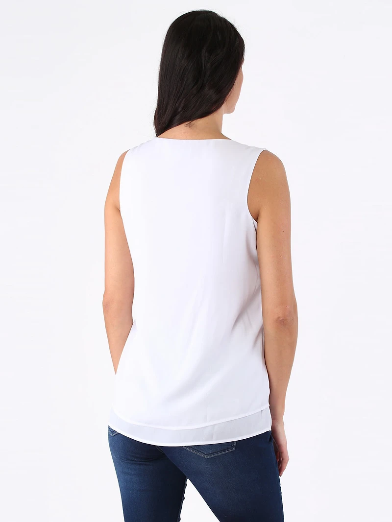 Sleeveless loose blouse