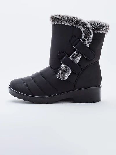 Bottes à talons plats