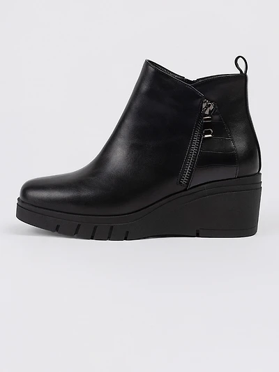 Bottes à talons compensés