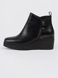 Bottes à talons compensés