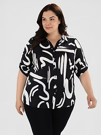 Blouse semi-ajustée à manches 3/4 avec boutons