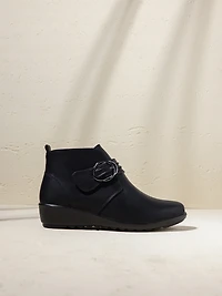 Bottes à talons compensés