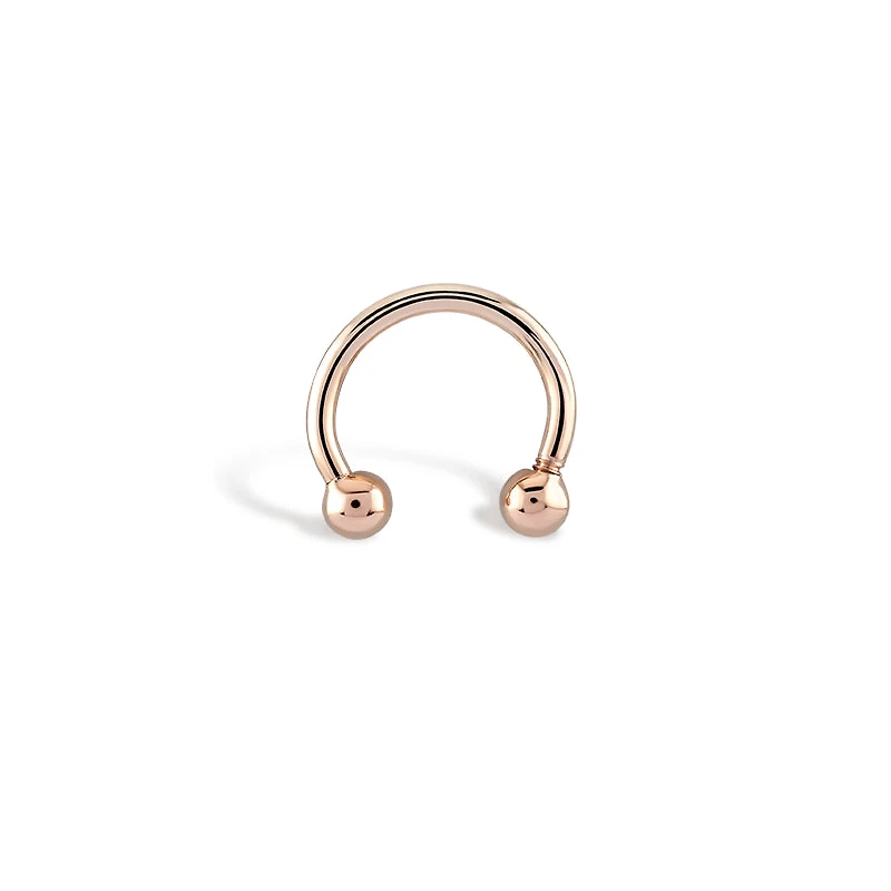 Golden Ball Septum Piercing