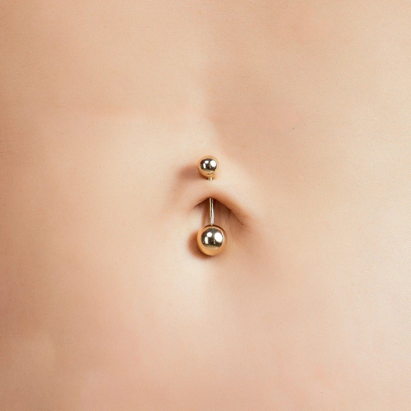 Golden Ball Belly Piercing