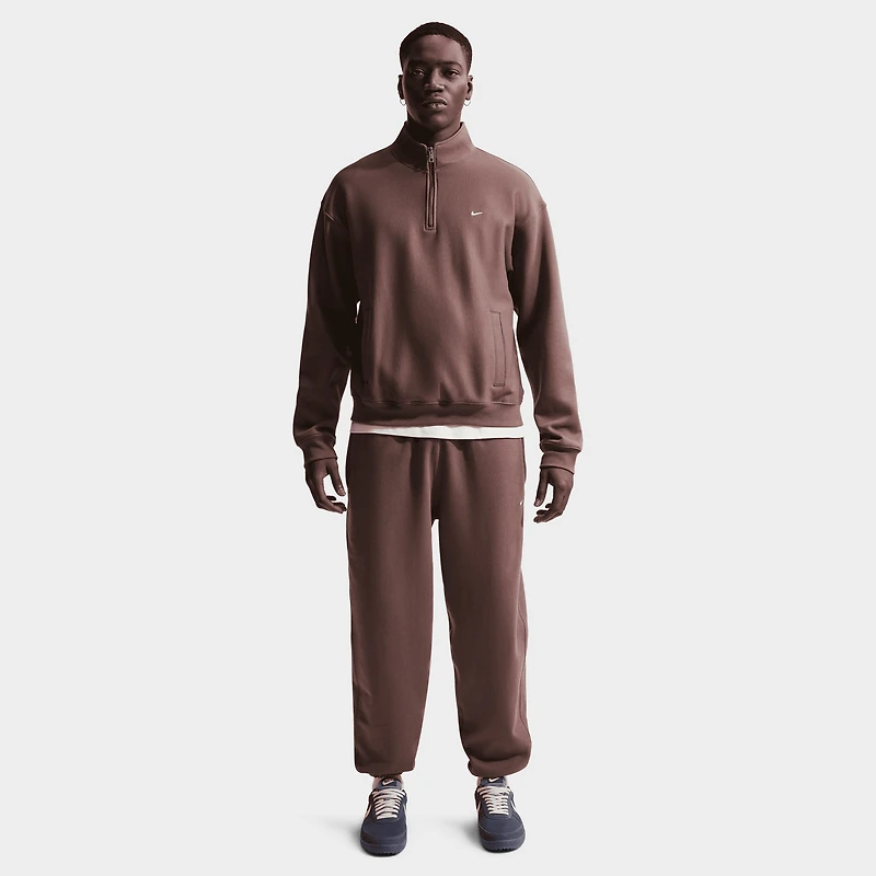 Nike Solo Swoosh Cuffed Fleece Pants / Purple