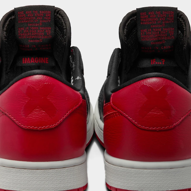Jordan 1 Rétro Low OG « Banned » Noir / Rouge Universitaire