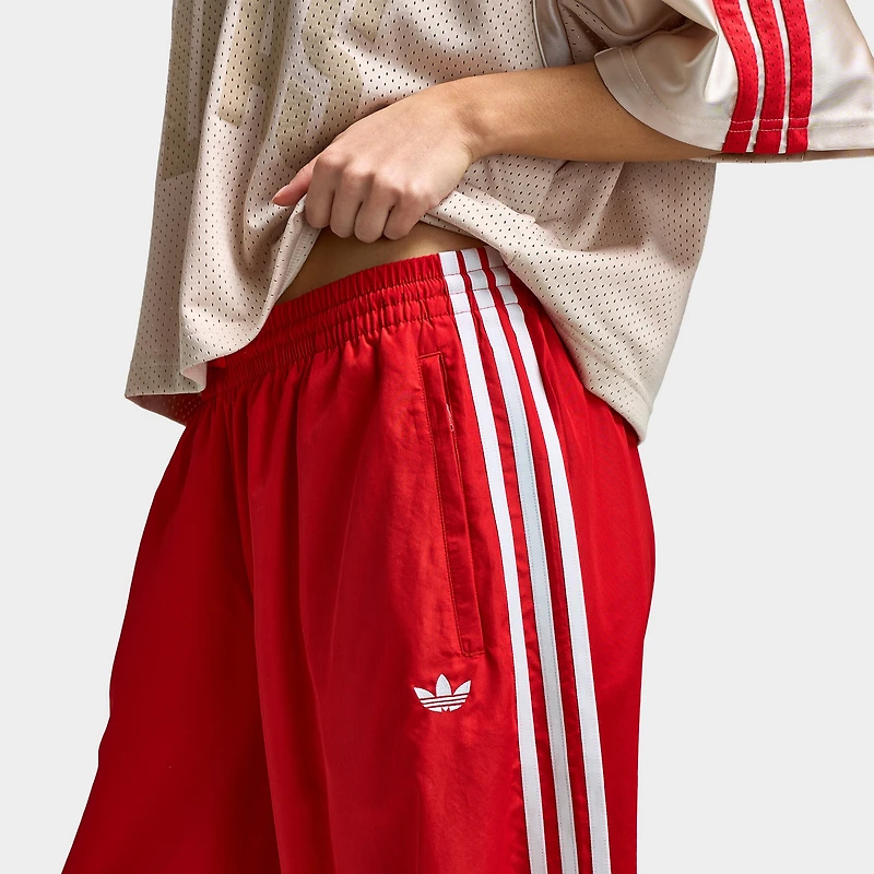 Pantalon de survêtement Firebird Adilenium adidas pour femme, couleur écarlate / blanc