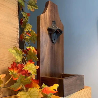 Bottle opener with catch