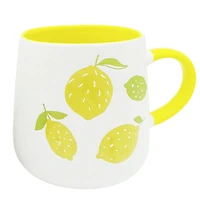 Cup with lemons & yellow handle