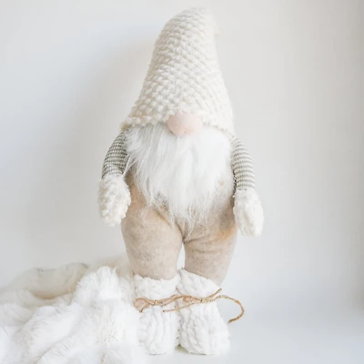 Brown and beige standing gnome