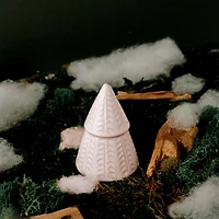 White fir-shaped candle