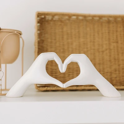 Hands in the shape of a heart