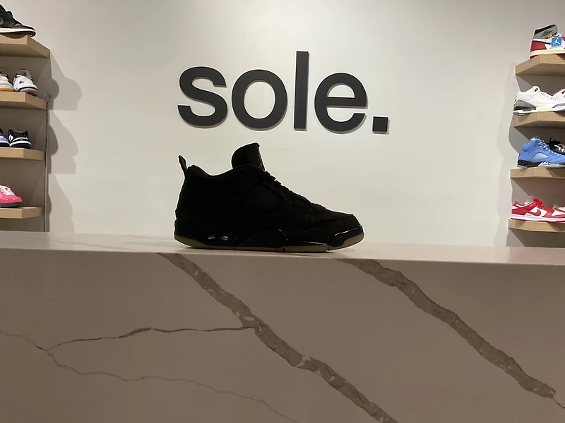 Pre-Owned KAWS x Air Jordan 4 Retro 'Black'
